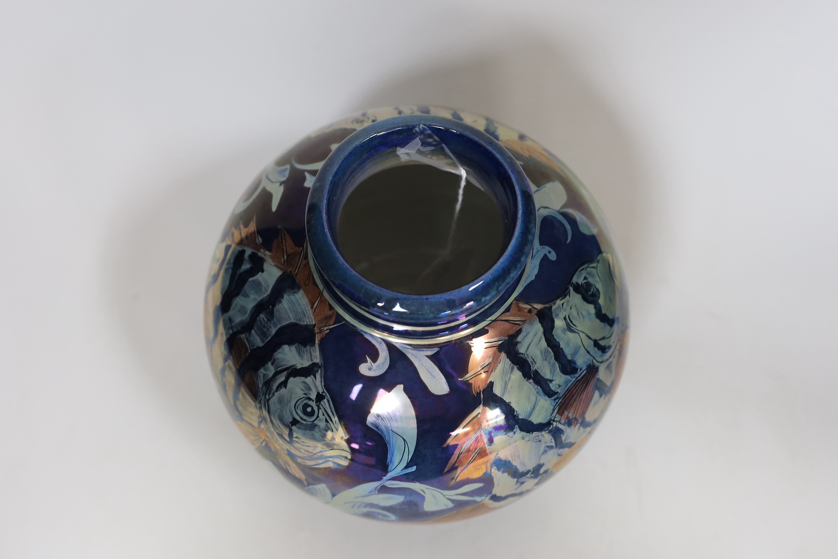 A Chiswell Jones art pottery lustre vase, decorated with three fish, No 8596, 21cm